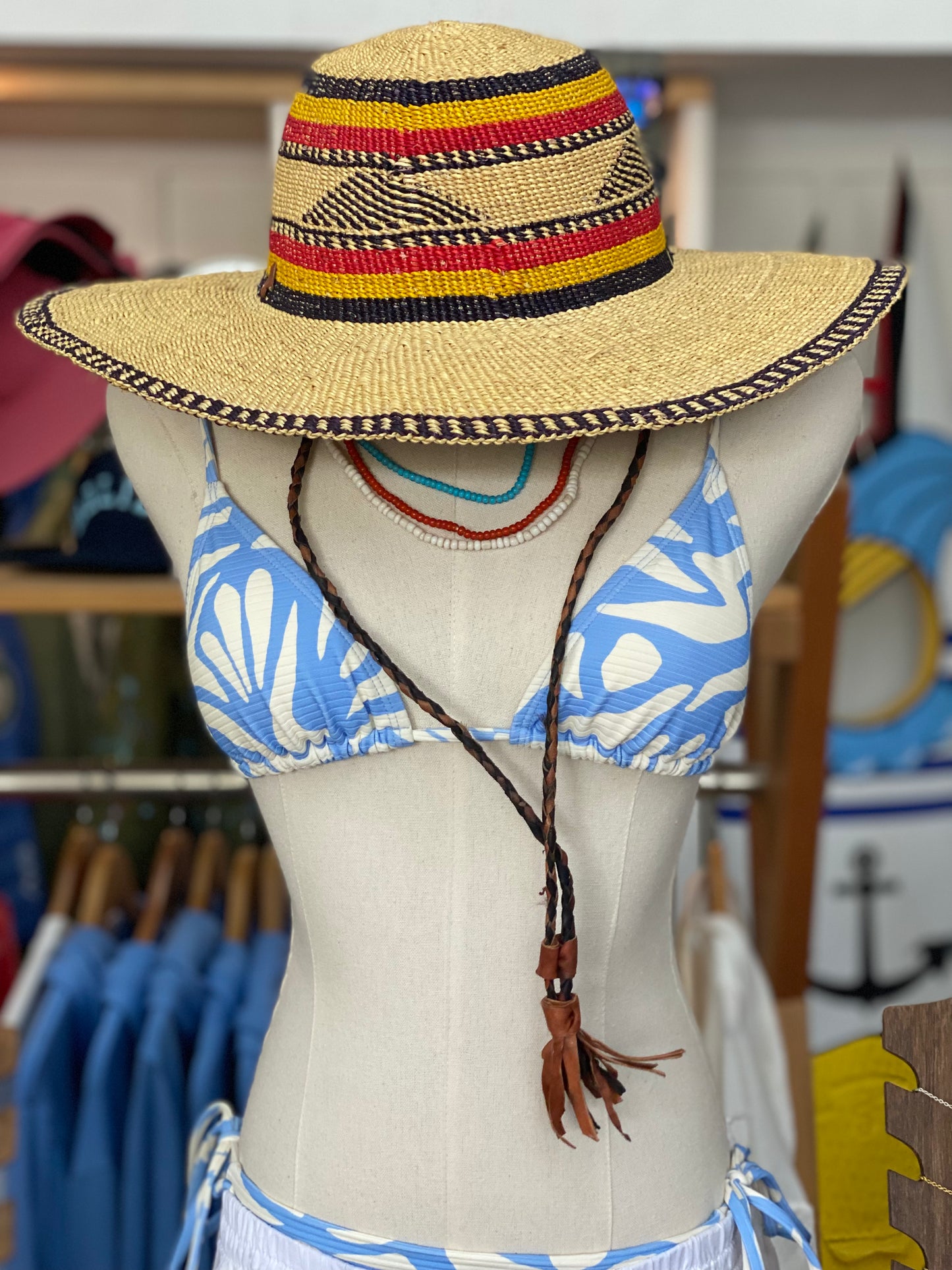 Hat with leather strap