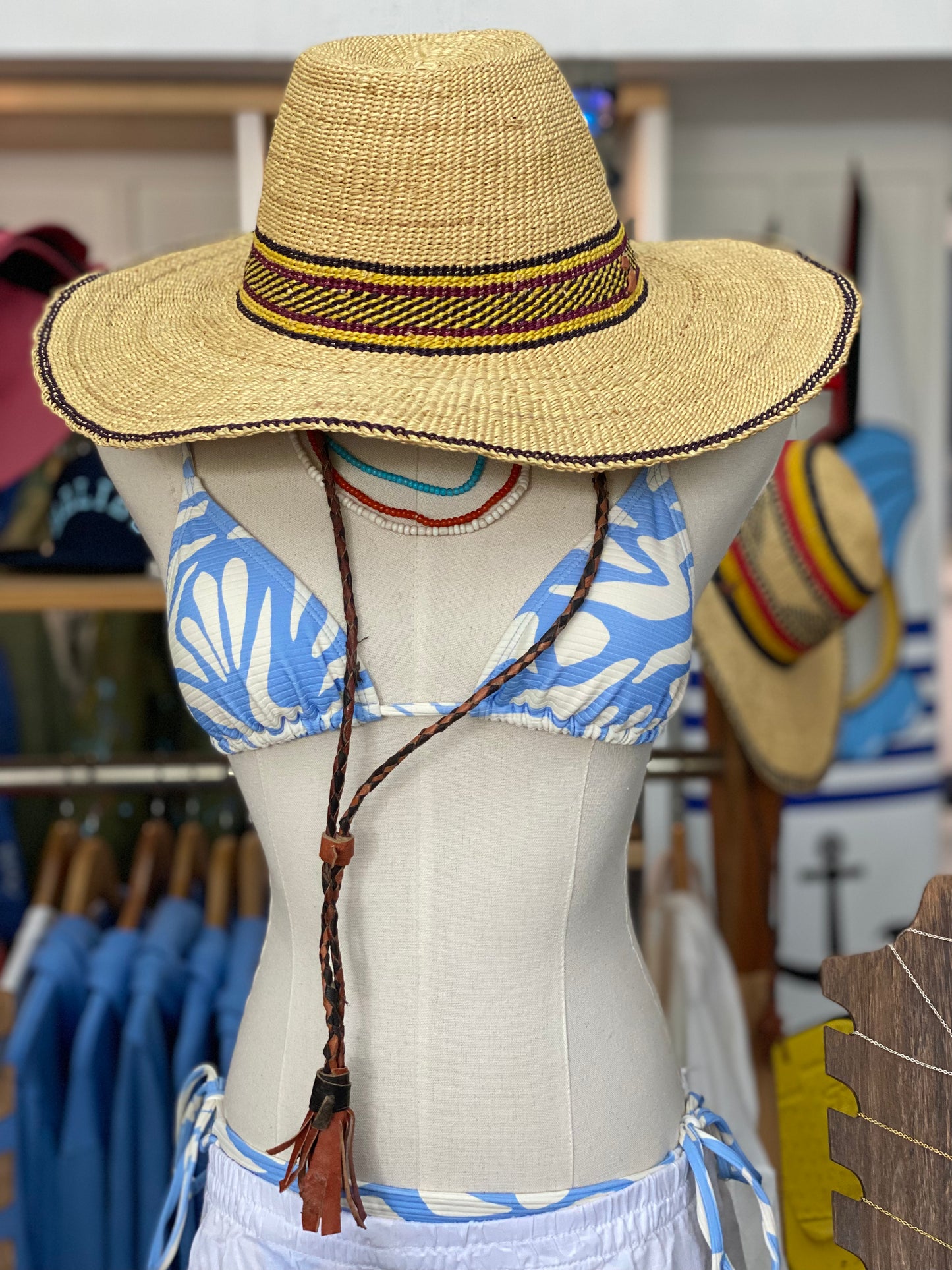 Hat with leather strap