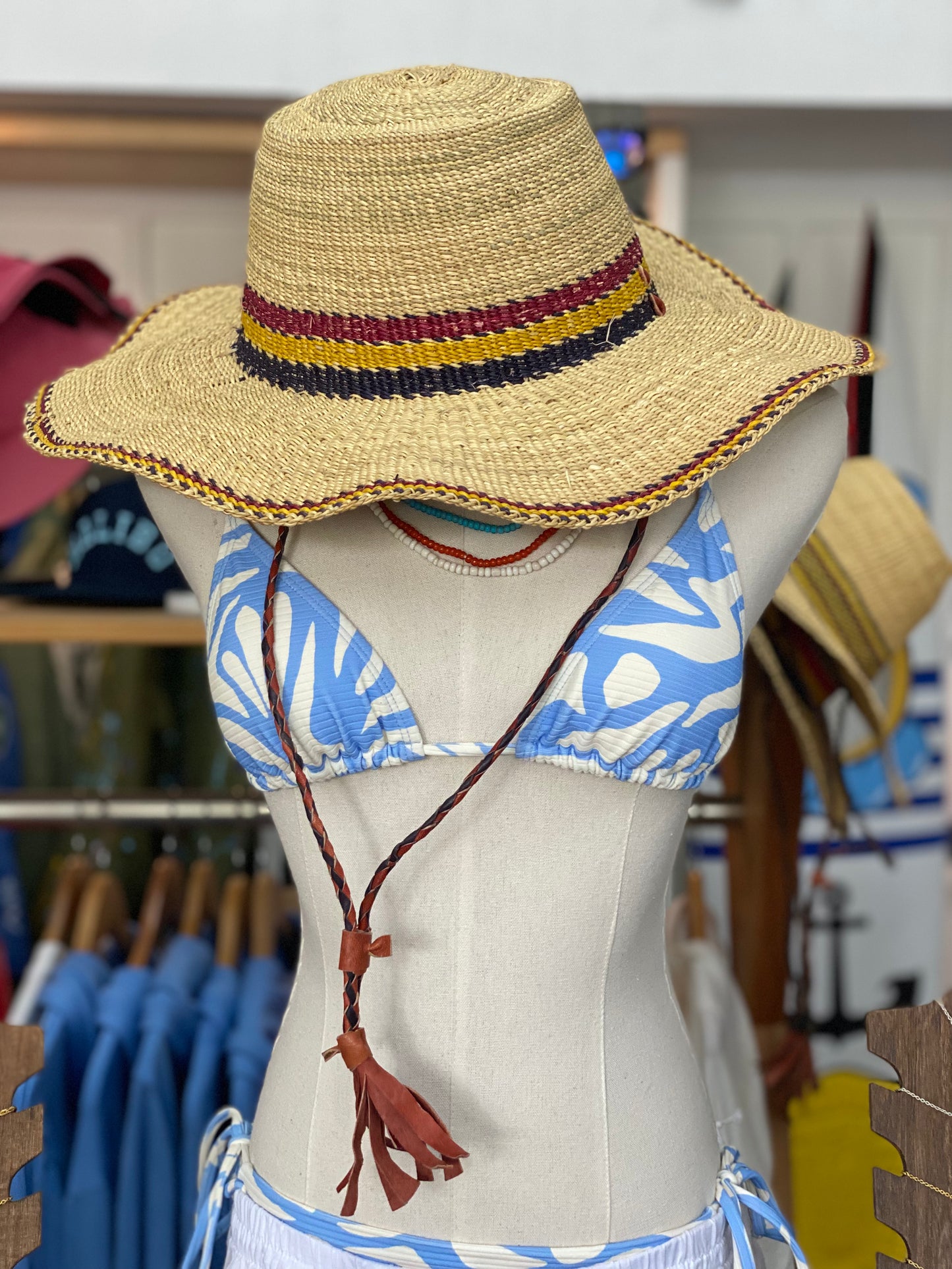 Hat with leather strap