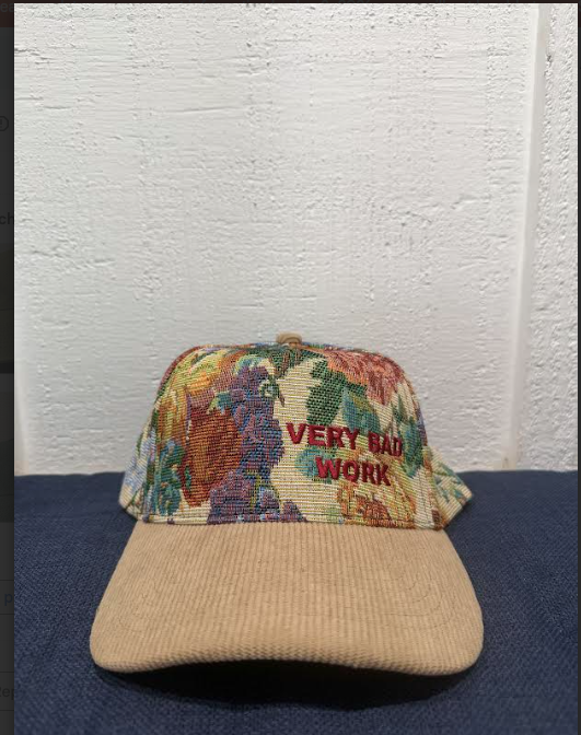 Very Bad Work Floral with red letters and tan bill