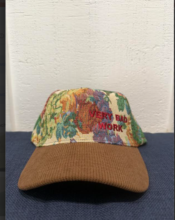 Very Bad Work hat Floral with red letters and brown bill